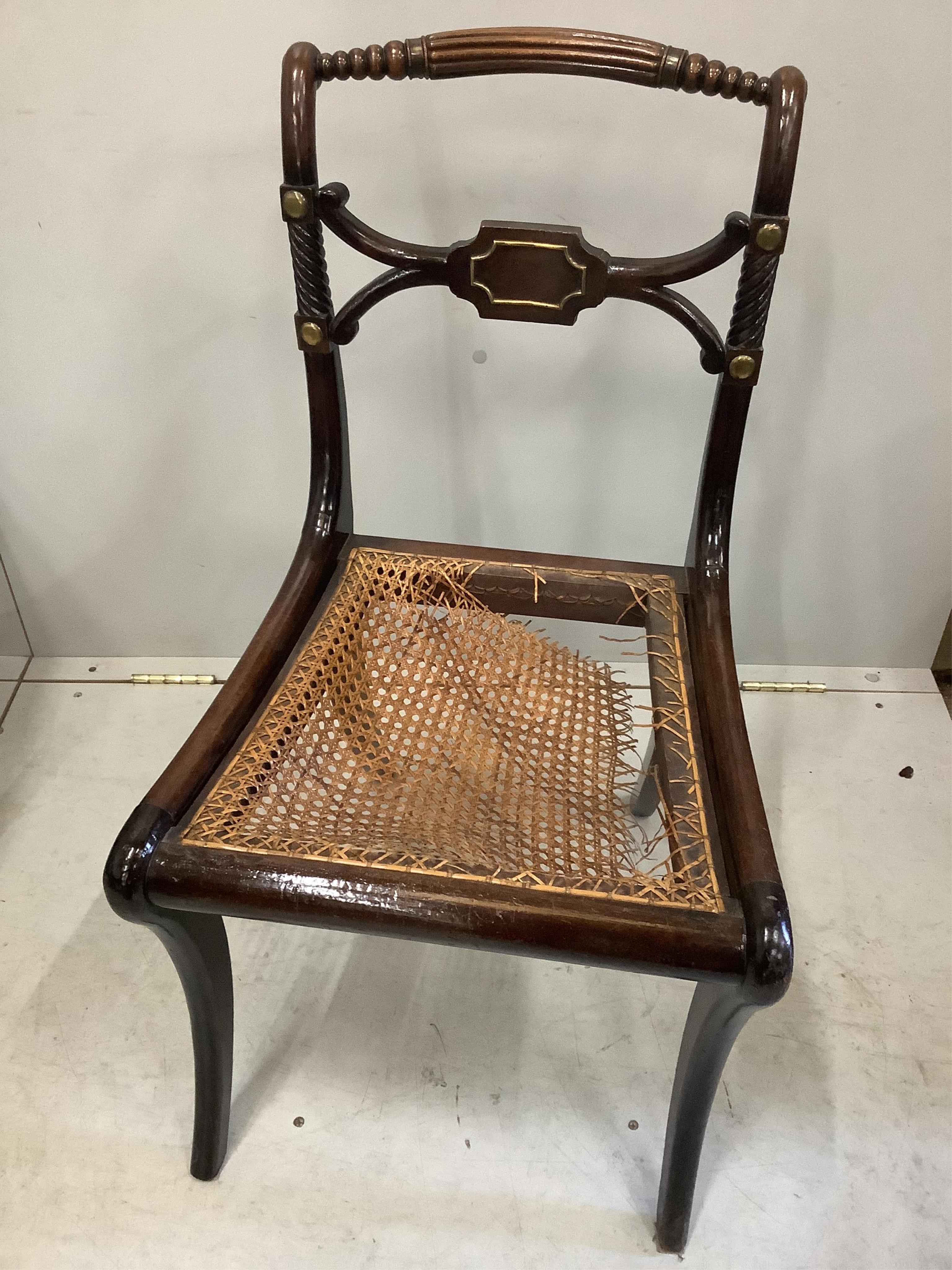 A set of six Regency brass mounted beech cane seat dining chairs